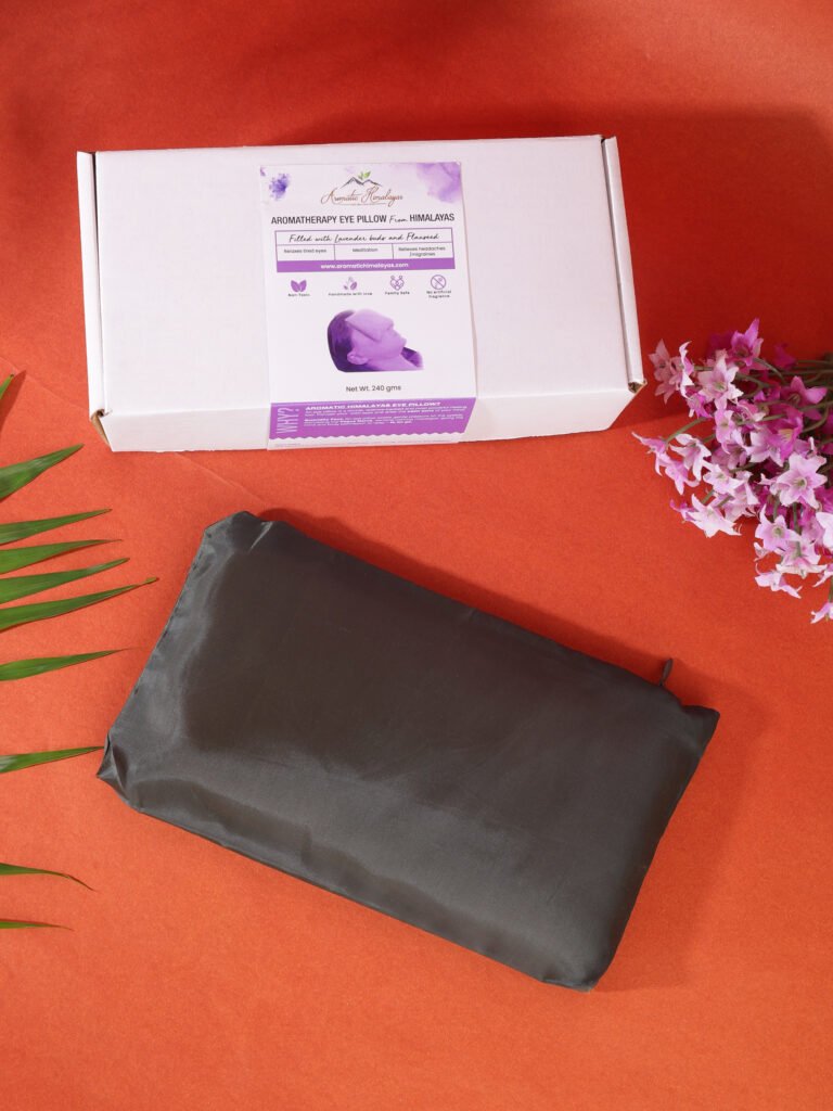 Peach aromatherapy eye pillow with its outer pouch and box